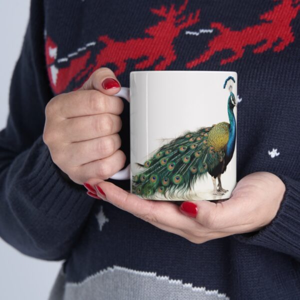 Coffee cup with picture of a peacock.